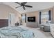 Serene main bedroom features large windows, plush seating, and a calming ambiance for ultimate relaxation at 15144 Dry Creek Rd, Noblesville, IN 46060