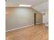 Spacious living room featuring wood floors, neutral walls, recessed lighting, and a large entryway at 1579 Winding Creek Trl, Brownsburg, IN 46112