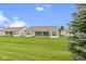 Well-maintained lawn view, showcasing the outdoor space between neighboring houses at 16243 Oliver St, Fishers, IN 46037