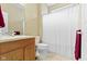 Bathroom features a vanity with wood cabinets, a ceramic tile floor, and a shower with curtain at 16243 Oliver St, Fishers, IN 46037