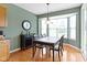 Eat-in dining area features a large bay window, chandelier, and wet bar at 16243 Oliver St, Fishers, IN 46037