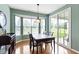 Dining area with a bay window providing lots of natural light and access to patio at 16243 Oliver St, Fishers, IN 46037
