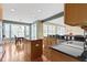 Eat-in kitchen features lots of natural light, granite countertops, and stainless appliances at 16243 Oliver St, Fishers, IN 46037