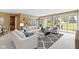 Open-concept living space with bright, stylish decor and easy access to the outdoors at 16243 Oliver St, Fishers, IN 46037