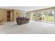 Open-concept living space with large sliding glass doors and easy access to the outdoors at 16243 Oliver St, Fishers, IN 46037