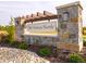 Attractive community entrance with stone pillars and landscaped surroundings at 1644 Winn Ct, Fortville, IN 46040
