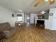 Open living space with wood floors, comfortable seating, and a dining area at 1833 Southernwood Ln, Indianapolis, IN 46231