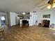 Spacious living area showcasing wood floors and an open layout at 1833 Southernwood Ln, Indianapolis, IN 46231