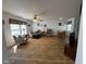 An open living room with comfortable seating, natural light, and dining area at 1833 Southernwood Ln, Indianapolis, IN 46231