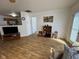 Open floor plan showcasing wood floors and natural light at 1833 Southernwood Ln, Indianapolis, IN 46231