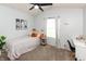 Bedroom with a single bed, a desk, and a ceiling fan at 204 S Hougland St, Trafalgar, IN 46181