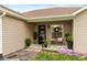 Inviting front porch with decorative plants, wreath, and welcome decor for a cozy entry at 204 S Hougland St, Trafalgar, IN 46181