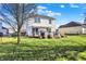 Backyard featuring a deck, grill and a lush green lawn at 209 Allen Ln, New Whiteland, IN 46184