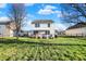 The home's backyard is spacious and features a wooden deck for relaxing outdoors at 209 Allen Ln, New Whiteland, IN 46184