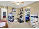 Bedroom or Office features sports decor, exercise machine and desk with closet space at 209 Allen Ln, New Whiteland, IN 46184