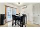 Cozy dining area with a modern table set and a bright, inviting ambiance at 209 Allen Ln, New Whiteland, IN 46184