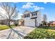 Two-story home featuring a two-car garage and manicured lawn at 209 Allen Ln, New Whiteland, IN 46184