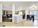 Inviting living room and dining area with neutral tones, open layout, and sliding glass doors at 209 Allen Ln, New Whiteland, IN 46184