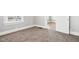 Bedroom featuring neutral carpeting, a window, and crisp, neutral paint at 2114 N Dexter St, Indianapolis, IN 46202