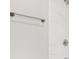 Bathroom view featuring a shower with white marble tile and silver hardware at 2114 N Dexter St, Indianapolis, IN 46202