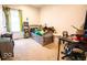 Bedroom with a built in bookcase, desk, and carpeted floors at 2239 E Werges Ave, Indianapolis, IN 46237