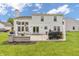 Backyard with spacious patio and room for outdoor entertaining at 2303 Cole Wood Ct, Indianapolis, IN 46239