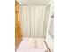 Bathroom featuring a neutral shower curtain and a towel rack with gray towels at 2303 Cole Wood Ct, Indianapolis, IN 46239