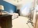 Comfortable bedroom featuring a plush bed, ceiling fan, and natural light from the window at 2303 Cole Wood Ct, Indianapolis, IN 46239