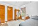 This bedroom features a mirrored wardrobe and a large window at 2303 Cole Wood Ct, Indianapolis, IN 46239