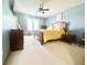 Bright bedroom with a large bed, soft carpet, and a window with natural light at 2303 Cole Wood Ct, Indianapolis, IN 46239