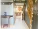 Warm foyer with wood accents, tile floors, and a view into the kitchen, offering a welcoming transition at 2303 Cole Wood Ct, Indianapolis, IN 46239