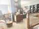 Cozy living room featuring a vintage dresser and comfortable seating area at 2303 Cole Wood Ct, Indianapolis, IN 46239