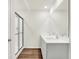 Bathroom featuring a double sink vanity and a glass-enclosed shower at 2764 Glade Ave, Plainfield, IN 46168