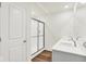 Bathroom featuring double vanity sinks and a glass-enclosed shower at 2764 Glade Ave, Plainfield, IN 46168