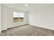 Bright bedroom featuring plush carpeting and a window showcasing an outside view at 2764 Glade Ave, Plainfield, IN 46168