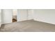 Bedroom featuring neutral carpeting with bathroom and closet entrances at 2764 Glade Ave, Plainfield, IN 46168