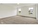 Spacious bedroom with neutral carpeting and multiple windows for natural light at 2764 Glade Ave, Plainfield, IN 46168