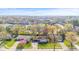 Neighborhood aerial view with charming homes and a serene pond, showcasing the community's appeal at 2815 Kay Ellen Dr, Indianapolis, IN 46229