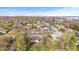 An aerial shot presents a residential neighborhood with tree-lined streets and a variety of housing at 2815 Kay Ellen Dr, Indianapolis, IN 46229