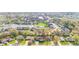 Scenic aerial view showcasing a community with a pond and playground, highlighting the neighborhood's amenities at 2815 Kay Ellen Dr, Indianapolis, IN 46229