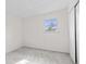 Neutral bedroom with carpet flooring, closet and window with exterior view at 2815 Kay Ellen Dr, Indianapolis, IN 46229