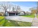 Attractive home featuring a long driveway and fresh landscaping, perfect for suburban living at 2815 Kay Ellen Dr, Indianapolis, IN 46229