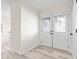 Bright and airy foyer featuring elegant double doors and modern flooring at 2815 Kay Ellen Dr, Indianapolis, IN 46229