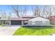 Charming home with well-manicured lawn and attached garage at 2815 Kay Ellen Dr, Indianapolis, IN 46229