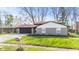 Charming home with well-manicured lawn and attached garage at 2815 Kay Ellen Dr, Indianapolis, IN 46229
