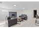 Finished basement with a cozy living area, stylish decor, and a modern fireplace, great for entertaining at 2815 Kay Ellen Dr, Indianapolis, IN 46229