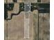 Aerial view of property lines surrounded by fields and trees near Knop Run at 3335 W 400 N, Anderson, IN 46011