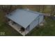 Aerial view of large gray metal outbuilding featuring overhead coverage for machinery at 3335 W 400 N, Anderson, IN 46011
