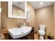 Bathroom with vanity, large sink, modern faucet, neutral walls, and a toilet at 3335 W 400 N, Anderson, IN 46011