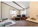 Cozy bedroom featuring natural light from two windows and comfortable furnishings at 3335 W 400 N, Anderson, IN 46011